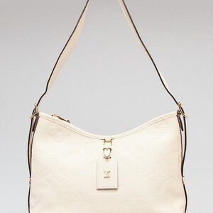 Louis Vuitton Creme Monogram Empreinte Leather Carryall PM Bag